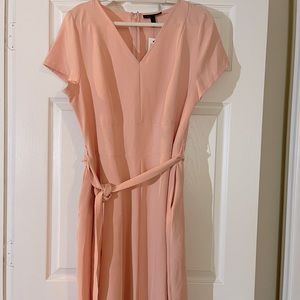 Pink fit & flare mini dress with belt.